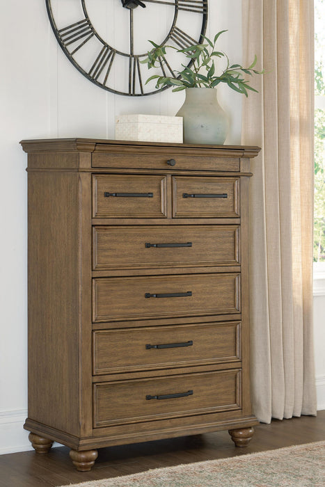 Karallin - Seven Drawer Chest - Medium Brown - Stylish Home Furniture