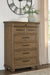 Karallin - Seven Drawer Chest - Medium Brown - Stylish Home Furniture